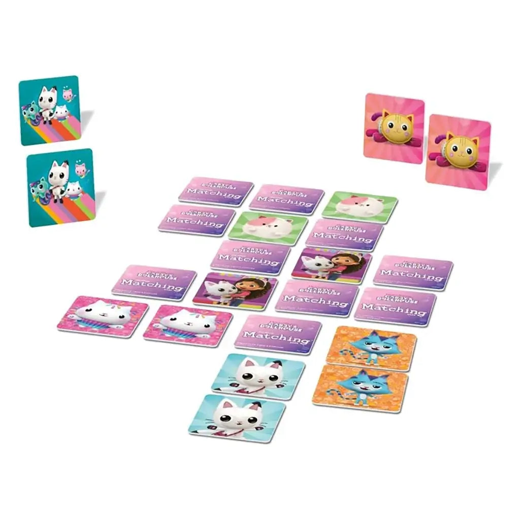 Gabby’s Dollhouse matching game tiles laid out on a white background, featuring Pandy Paws, Kitty Fairy, Mercat, and playful cat-themed characters in bright, colorful designs.