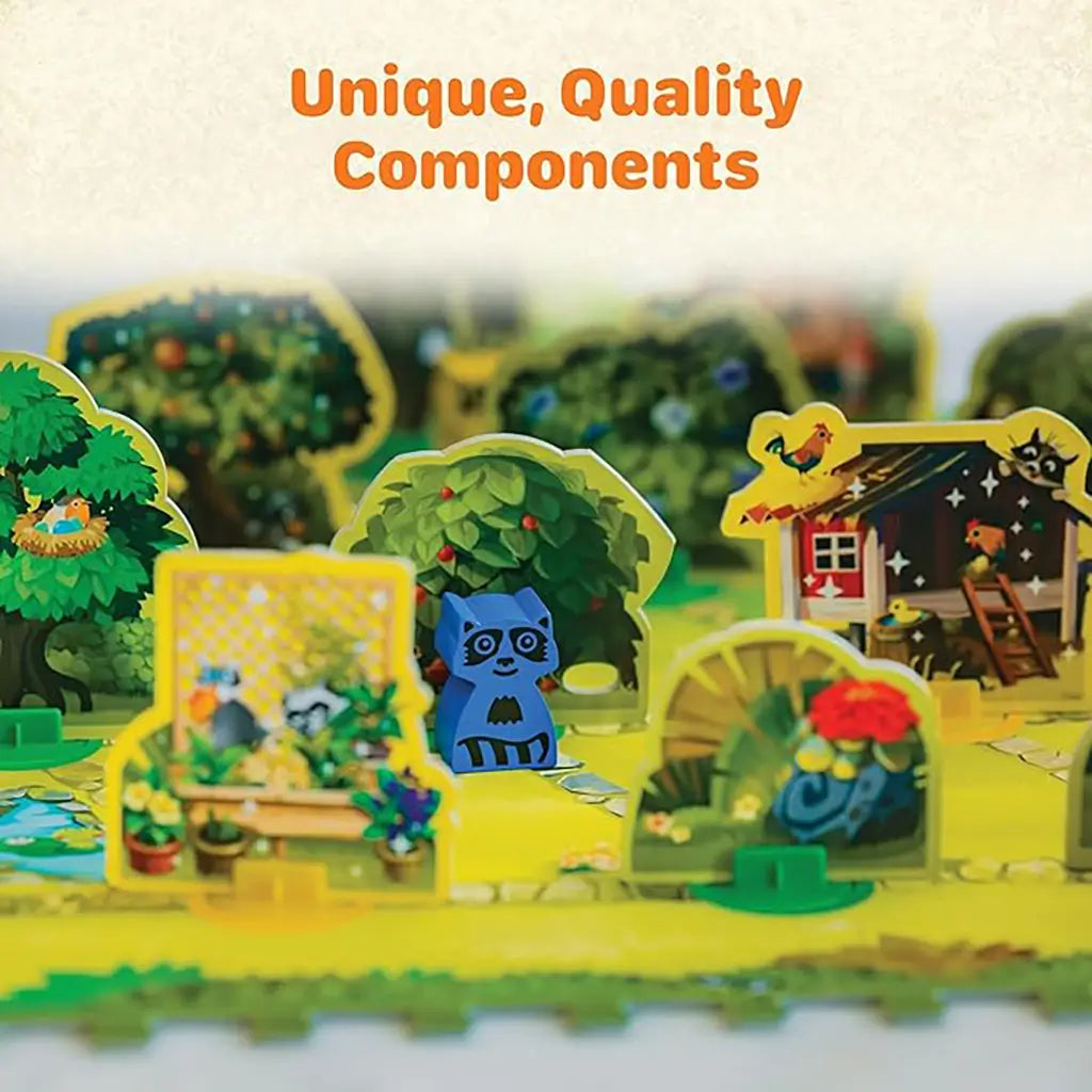 Close-up of Ravensburger Garden Heist board with a blue wooden raccoon piece placed among detailed cardboard trees, birdhouses, and flowers, highlighting the game’s unique illustrated components.