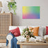 Modern living room with white sofa, colorful pillows, and plants displays the completed Ravensburger Krypt gradient puzzle framed on the wall as artwork.