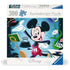 Disney Ravensburger 300 piece puzzle box with artwork of Mickey Mouse in red shorts and yellow shoes, surrounded by whimsical hats, books, and magical fantasy items.