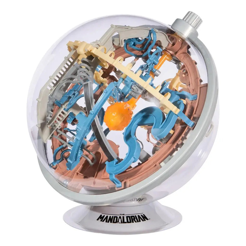 Star Wars The Mandalorian gravity maze ball features transparent plastic casing with curved blue ramps, tan bridges, and copper circular tracks, forming a handheld 3D puzzle sphere.