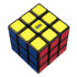 Rubik’s Timer Cube angled view highlights a black plastic 3x3 puzzle with yellow top, blue and red sides, and a centered digital timer screen for tracking solve times.