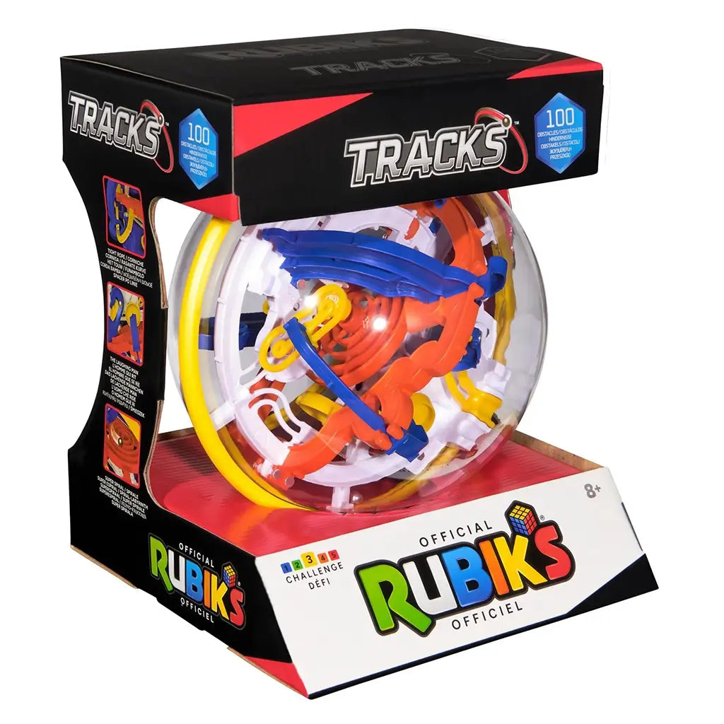 Rubik’s Tracks 100 obstacles 3D gravity maze features a clear plastic spherical puzzle with blue, orange, yellow, and white tracks, displayed in black and red retail packaging on a white background.