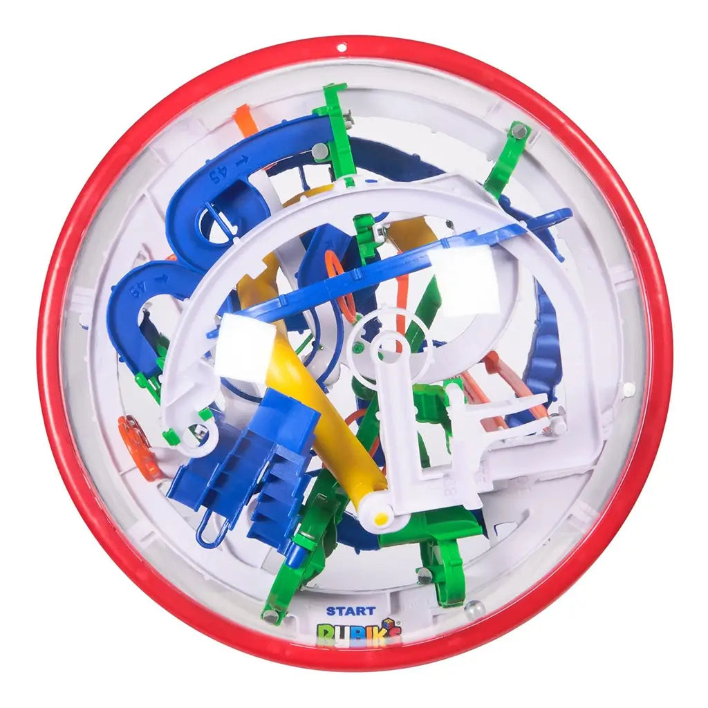 Rubik’s Tracks 125 obstacle maze top view reveals a transparent plastic sphere with layered blue curves, green loops, white frames, and yellow ramps arranged in a circular 3D puzzle layout.