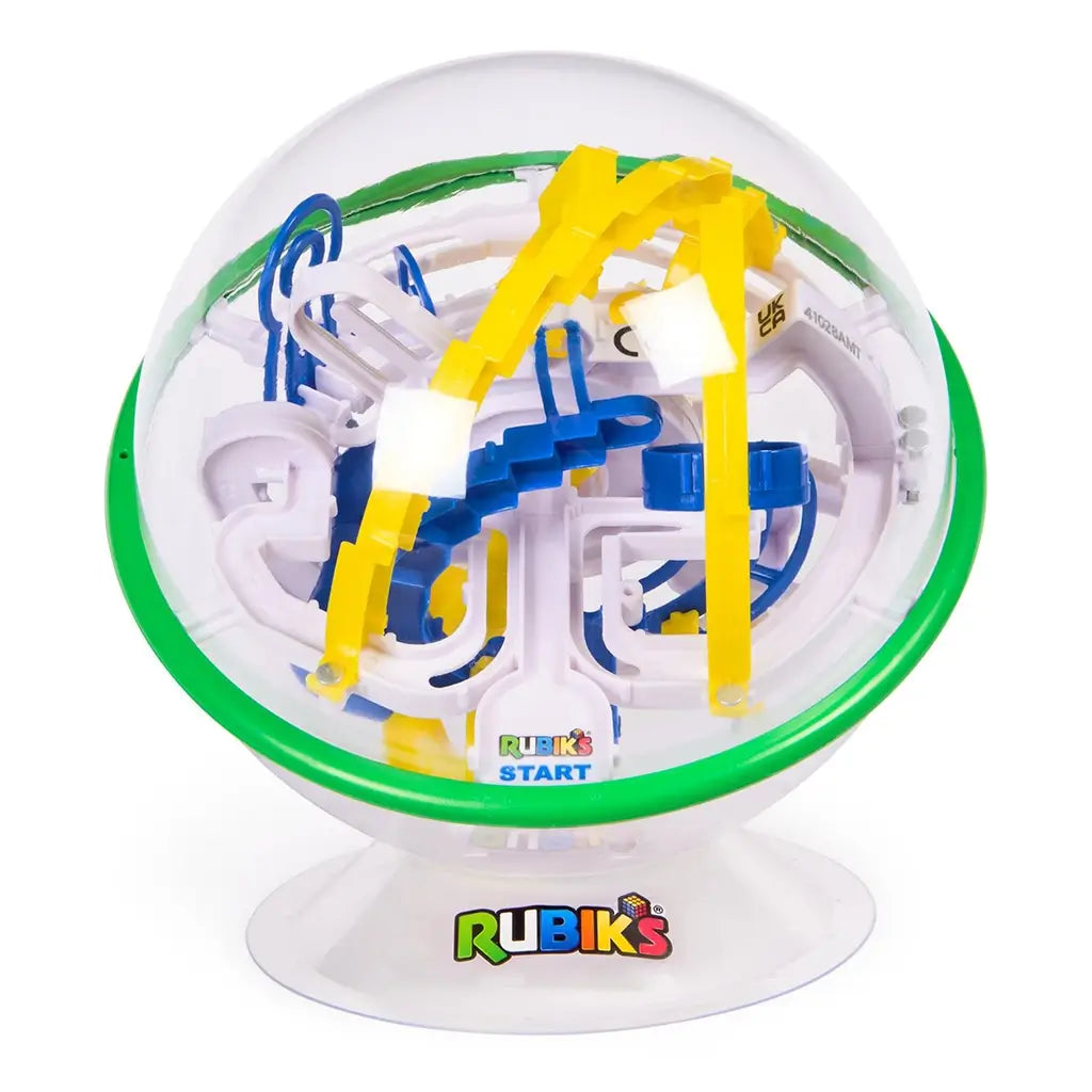 Rubik’s Tracks 70 obstacle maze ball features a transparent plastic sphere with green ring and bold yellow and blue track system, designed for flip, twist, and spin 360-degree gameplay.