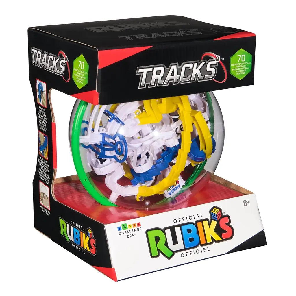 Rubik’s Tracks 70 obstacles puzzle packaging features a black and red retail box with clear window showcasing the green, yellow, blue, and white 3D gravity maze sphere inside.