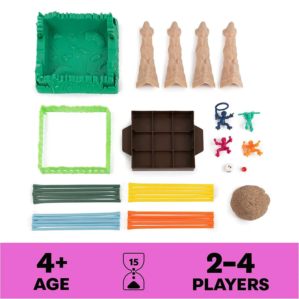 Complete contents of Sink N’ Sand board game displayed neatly, including jungle frame, columns, sticks, explorers, sand, ruby gem, die, and instruction sheet.