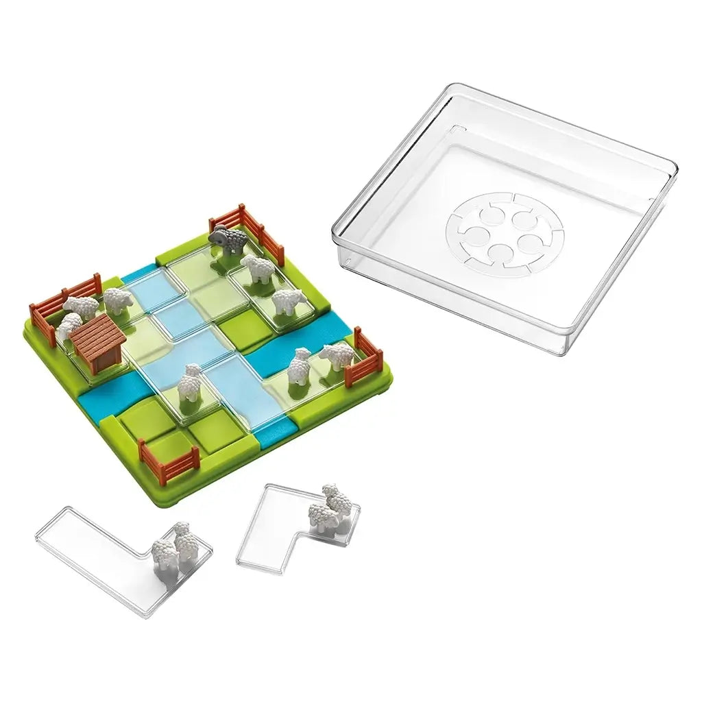 Counting Sheep brainteaser set displayed with green and blue grid board, transparent puzzle pieces, tiny sheep figures, and a clear plastic storage lid beside it.