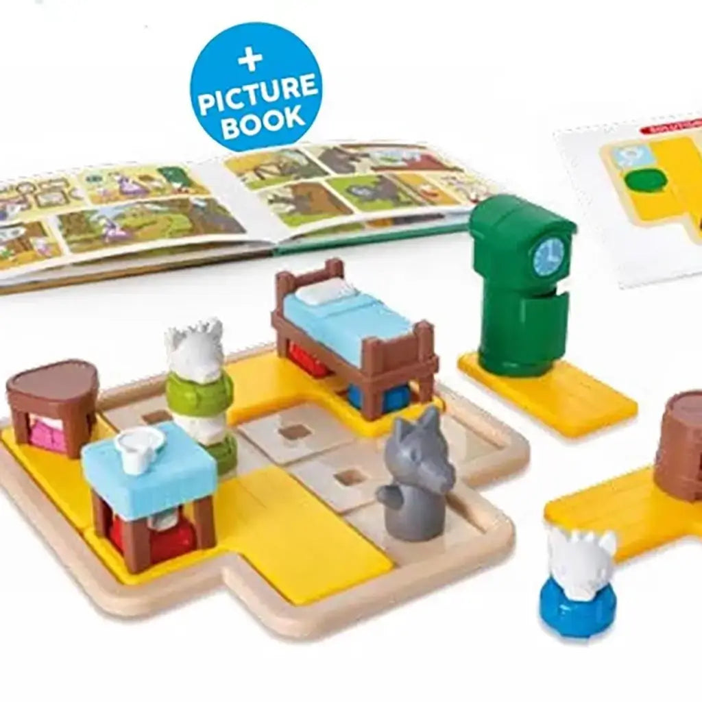 Smart Games Hide & Goat Seek puzzle set with board, animal and furniture pieces, shown with included illustrated picture book for storytelling and interactive preschool play.