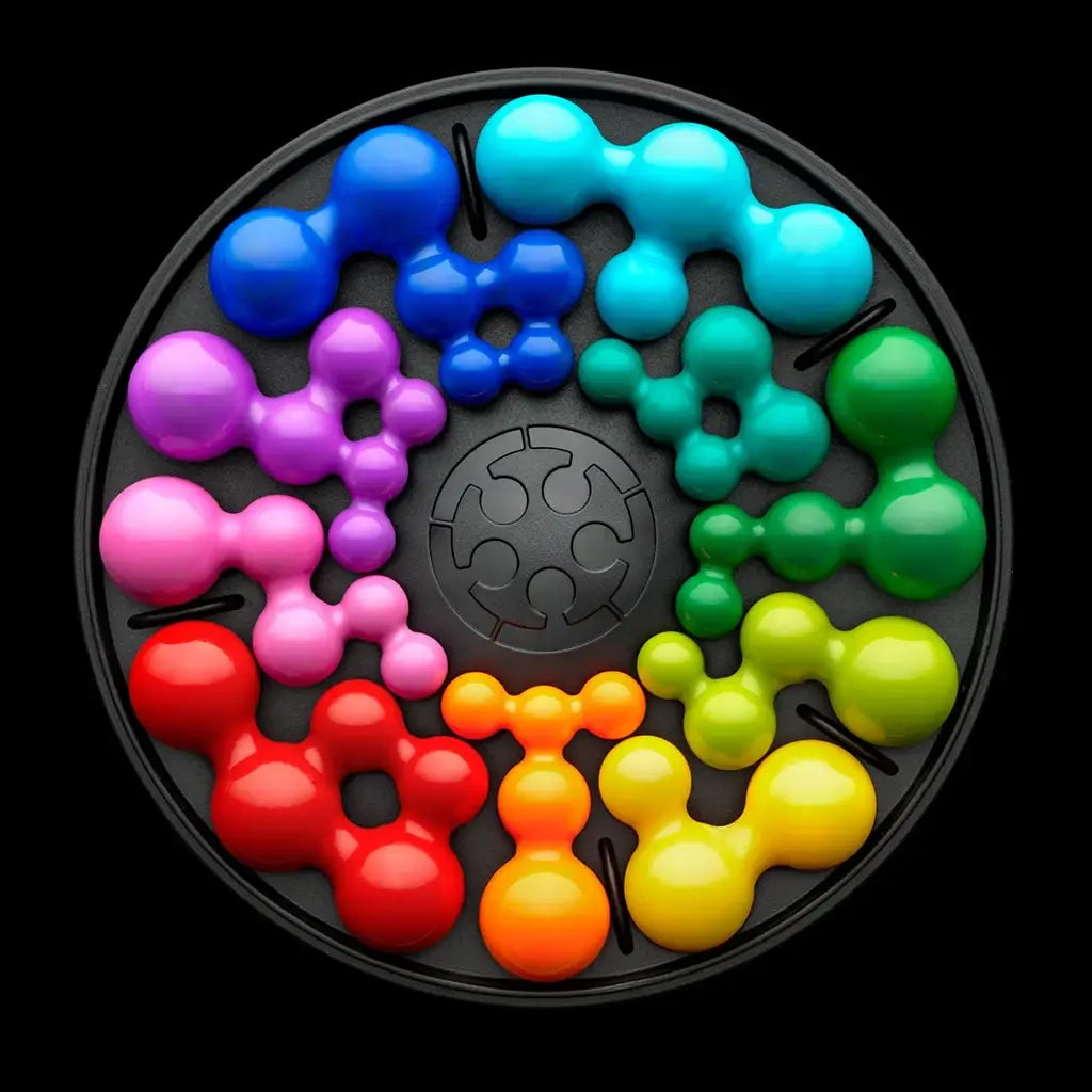 SmartGames IQ Circle puzzle fully assembled in a circular tray with colorful glossy ball-shaped clusters in red, orange, yellow, green, blue, pink, and purple.