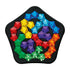 Puzzle game board with colorful plastic gem-shaped pieces in red, blue, green, yellow, orange, and purple arranged in a pentagon-shaped black tray.