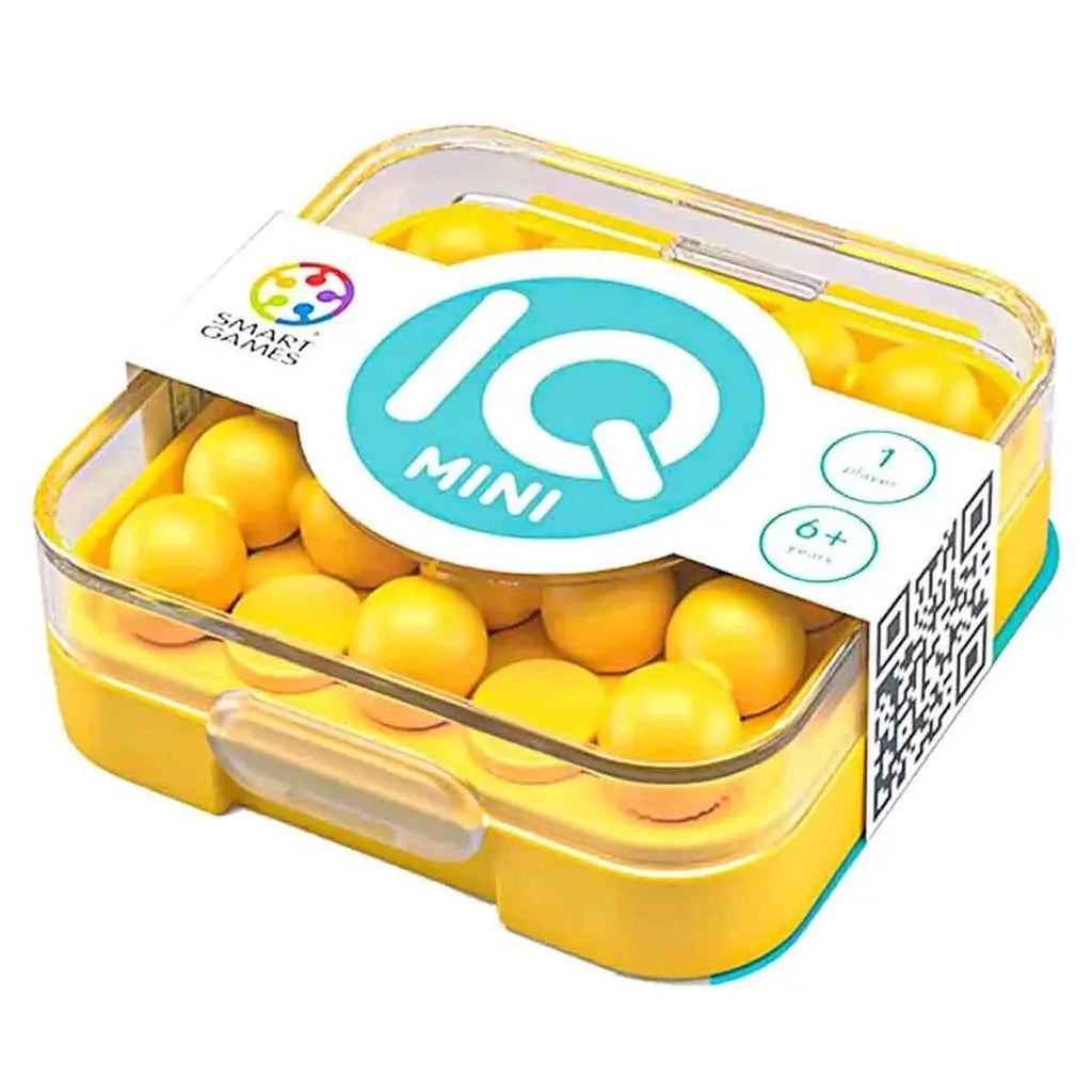 Close-up of yellow SmartGames IQ Mini puzzle in a clear square plastic case with logo label, featuring glossy spherical beads for engaging solo play.