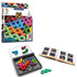 Front view of SmartGames IQ Noodles packaging showing interlocked rainbow-colored noodle puzzle pieces arranged inside the game tray for 1 player logic play.
