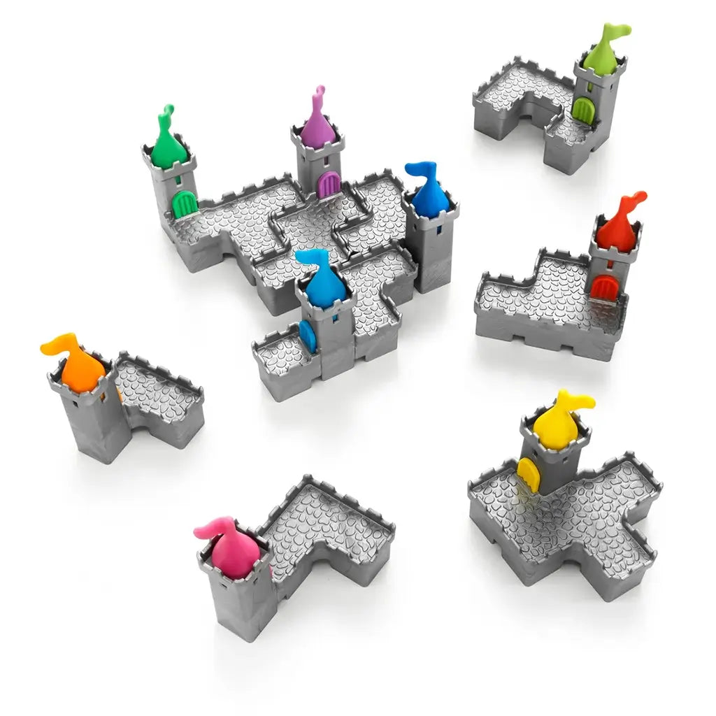 Nine Smart Games Tower Stacks puzzle pieces displayed, each shaped like gray castle walls with battlements and turrets, topped with flags in different bold colors.