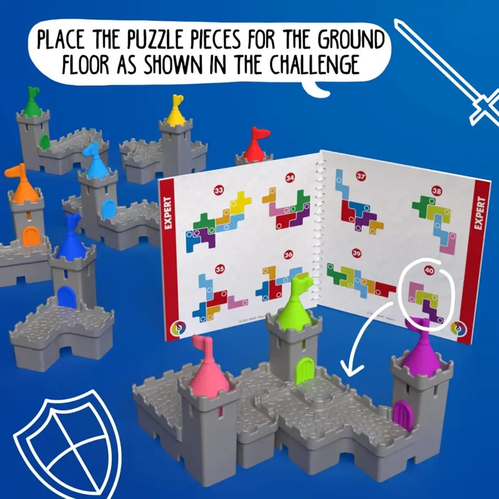 Tower Stacks puzzle pieces arranged with open booklet showing challenge diagrams, guiding players to place castle towers with colorful flags on the gray interlocking base.