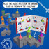 Tower Stacks puzzle pieces arranged with open booklet showing challenge diagrams, guiding players to place castle towers with colorful flags on the gray interlocking base.