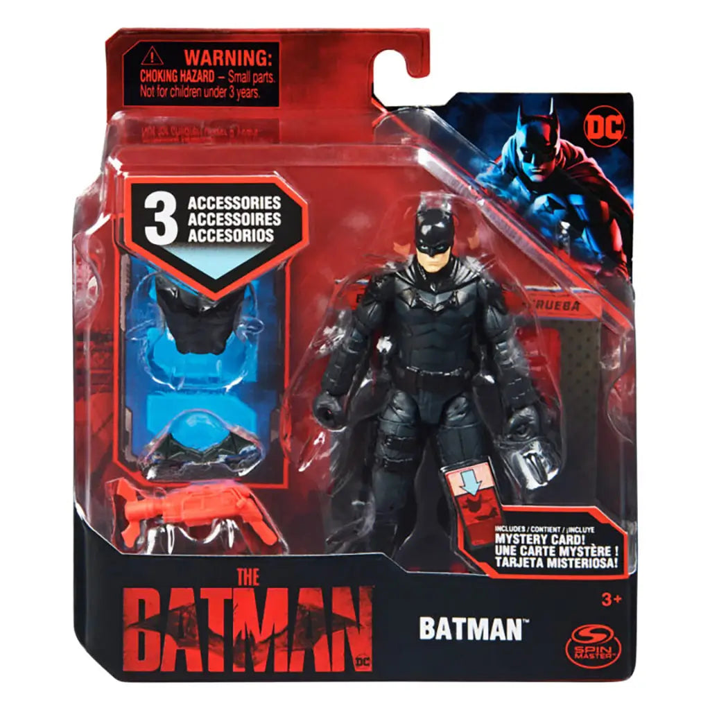 DC Comics Spin Master The Batman 4-inch action figure in black armor suit displayed in red retail packaging with accessories and character artwork in top corner.