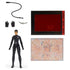 Selina Kyle action figure in black suit shown with whip, gloves, knife, red decoder card, and mystery map accessory, laid out neatly against white background.
