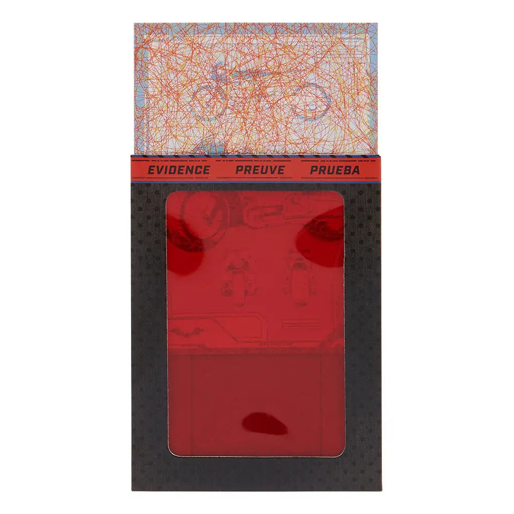 Red decoder card and colorful coded map accessory from Spin Master DC Comics Selina Kyle figure set, designed as evidence-themed toy inserts for interactive play.