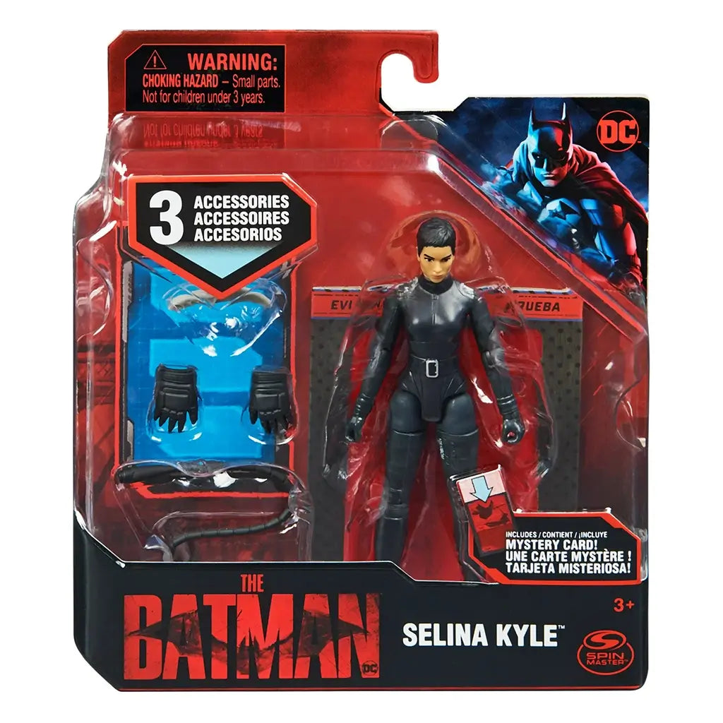 Packaged Spin Master DC Comics Selina Kyle action figure in sleek black outfit, displayed with three accessories in red and black box featuring Batman artwork.