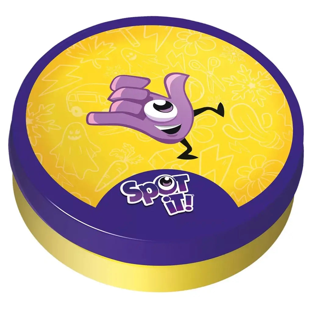 Spot It! Classic storage tin features a yellow metal-look round case with a purple rim, smiling purple hand mascot, subtle symbol pattern, and Spot It! logo on the lid.