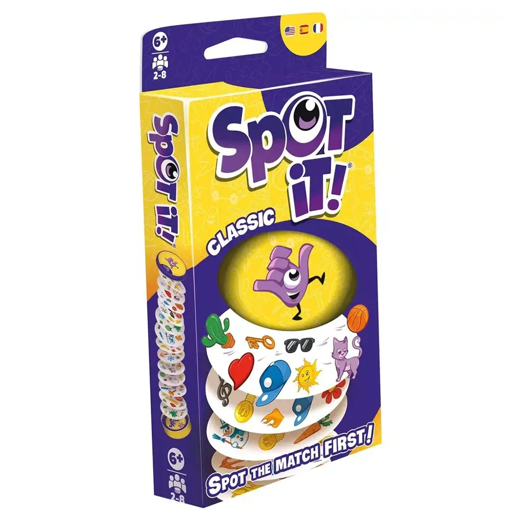 Spot It! Classic card game package features yellow and purple cardboard with a rectangular hanging box, round storage tin, colorful symbol cards, logo, and matching-game prompt.