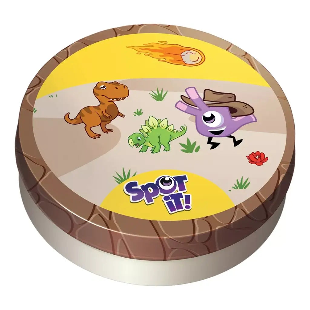 Spot It! Dinosaurs card game tin features a brown metal-look round case with a yellow dinosaur scene, cartoon T. rex and stegosaurus, purple mascot, and logo on white.