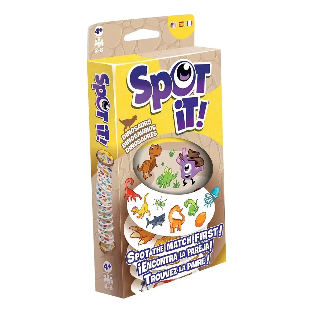 Spot It! Dinosaurs card game package has yellow and tan cardboard with a side-angle view, cartoon dinosaurs, round symbol cards, purple logo, and multilingual match prompt.