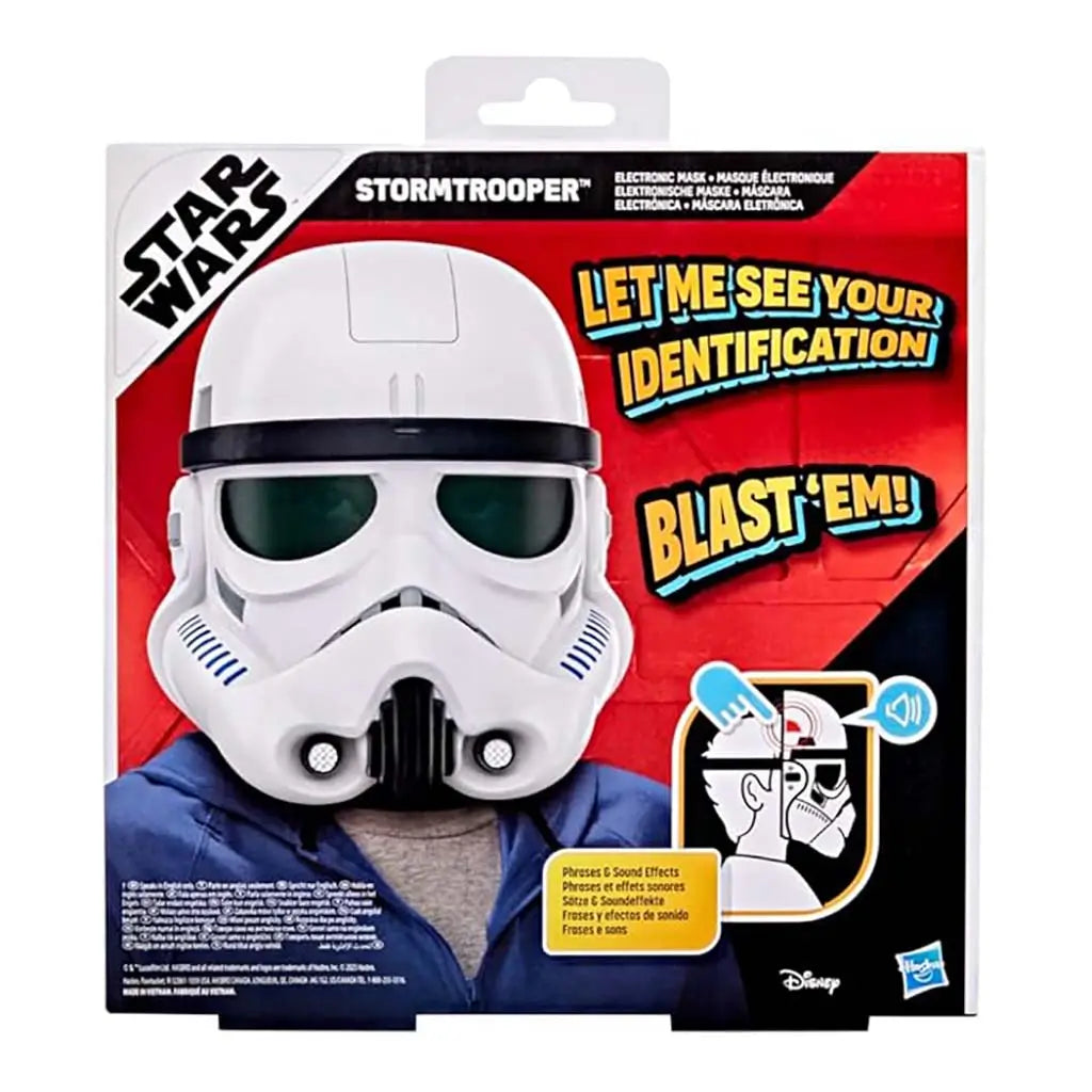 Star Wars Stormtrooper electronic helmet packaged on red and black backing card with comic-style speech bubbles promoting sound effects and phrases for interactive character roleplay.