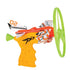 Toy stunt flyer launcher displays bright yellow molded handle, orange and white patterned airplane body and wide green rotor ring designed for energetic outdoor flight on a clean white backdrop.