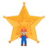 Super Mario Galaxy Movie Mario figure wears red and blue overalls with white gloves and brown shoes, standing before a large translucent orange-gold star on white.