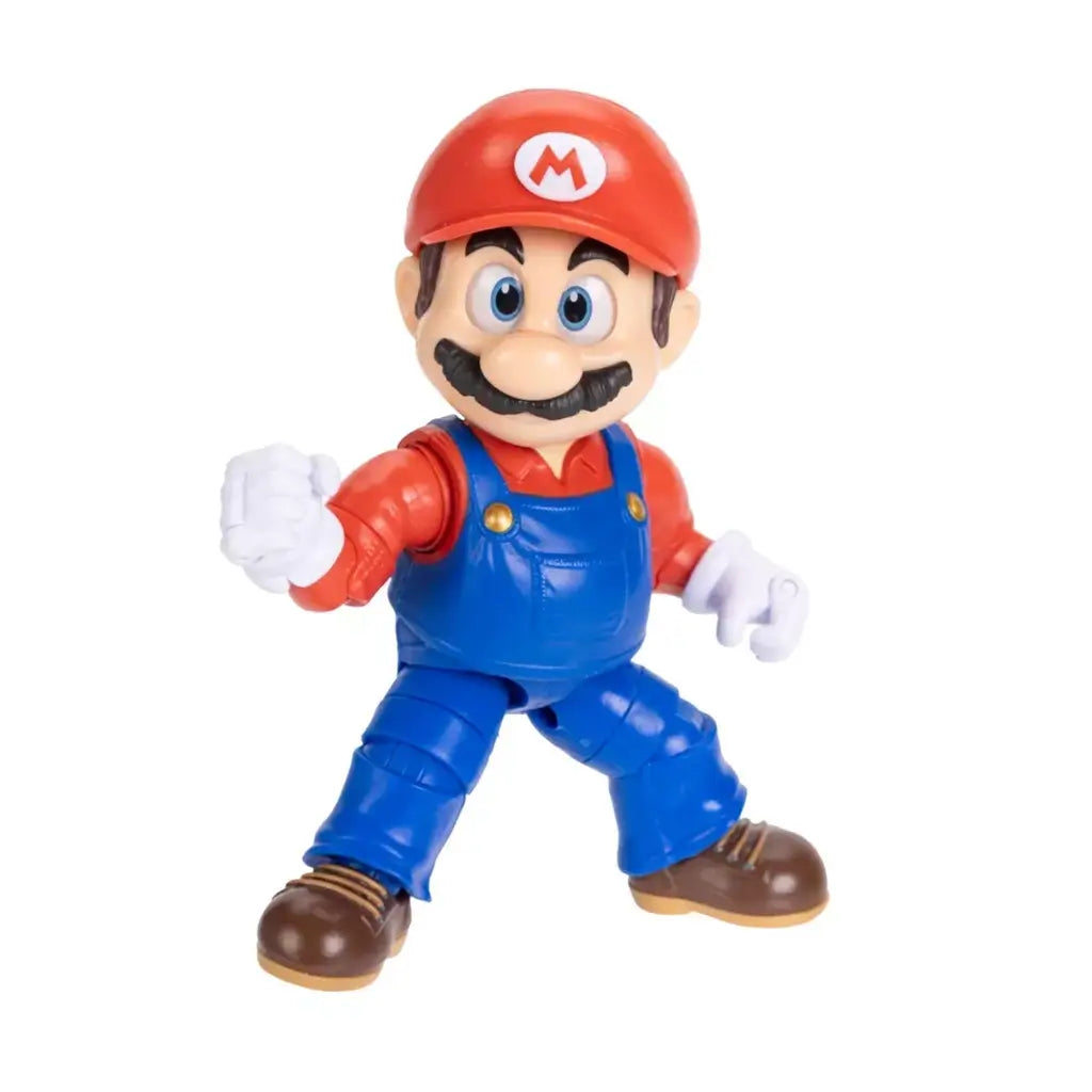 Super Mario Galaxy Movie Mario figure features red and blue articulated plastic, white gloves and brown shoes, posed in a wide action stance with one fist raised on white.