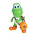 Super Mario Galaxy Movie Yoshi figure features green textured plastic, a white belly and orange boots, posed with an orange shoulder bag against a clean white background.