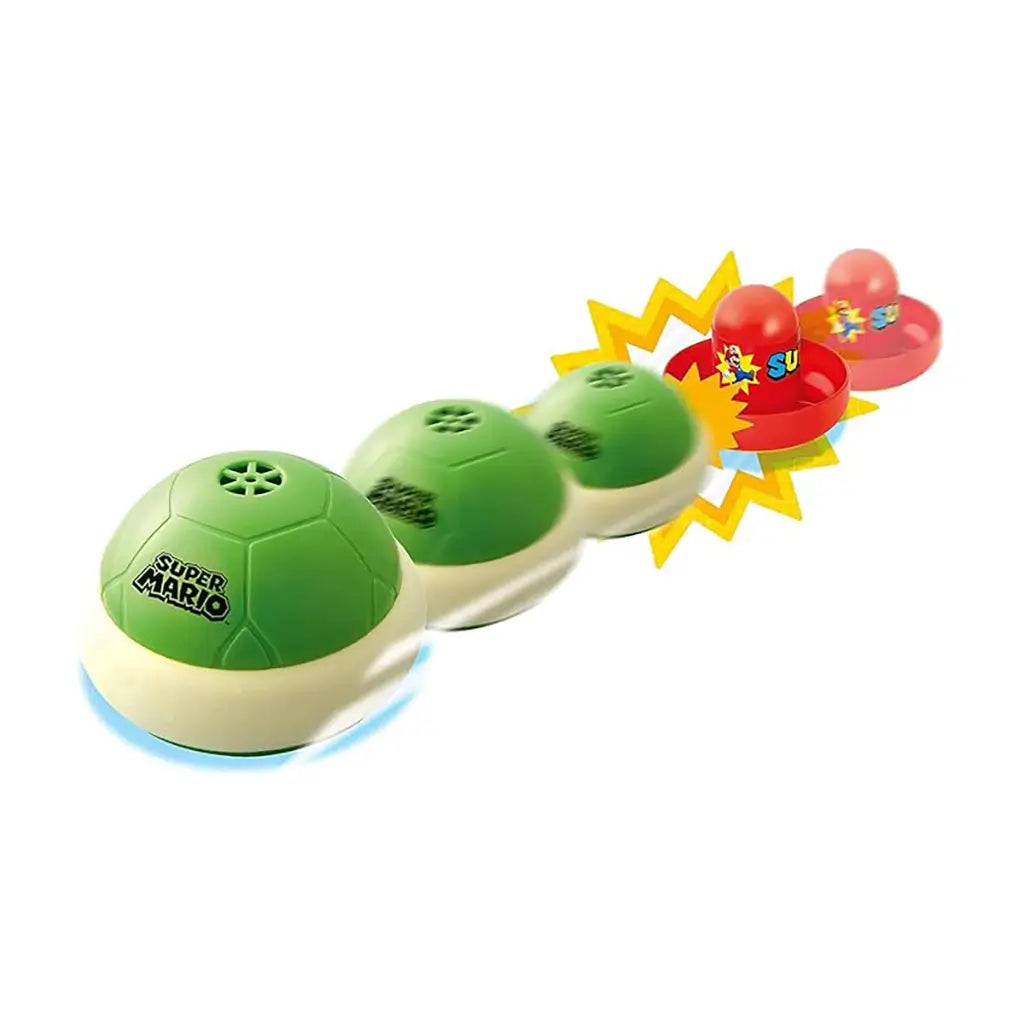 Green Super Mario hover shell puck gliding forward and colliding with red strikers marked “SUPER MARIO,” with animated action effects highlighting fast gameplay.