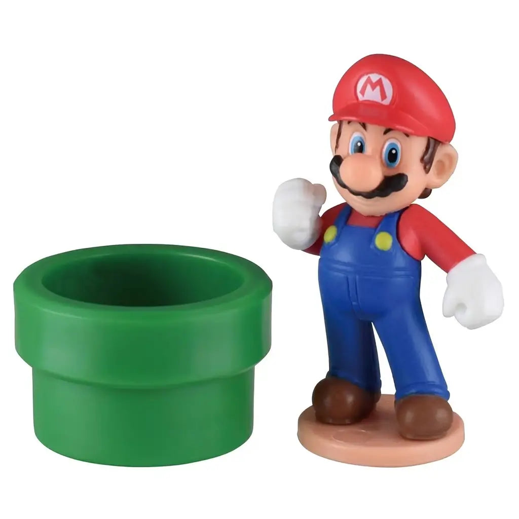 Nintendo Super Mario collectible mini figure featuring Mario in red cap and blue overalls with a green warp pipe accessory, made of smooth plastic and displayed on a neutral surface.