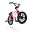 Tech Deck BMX finger bike in pink metal frame with black rubber tires and plastic details, angled compact stunt form with pegs and handlebars, designed for tricks on a minimal white studio background.