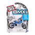 Tech Deck BMX toy packaging in white cardboard with gray chain graphic border and clear plastic blister, displaying blue Sunday BMX bike, bold branding, age label, and safety warnings on a clean background.