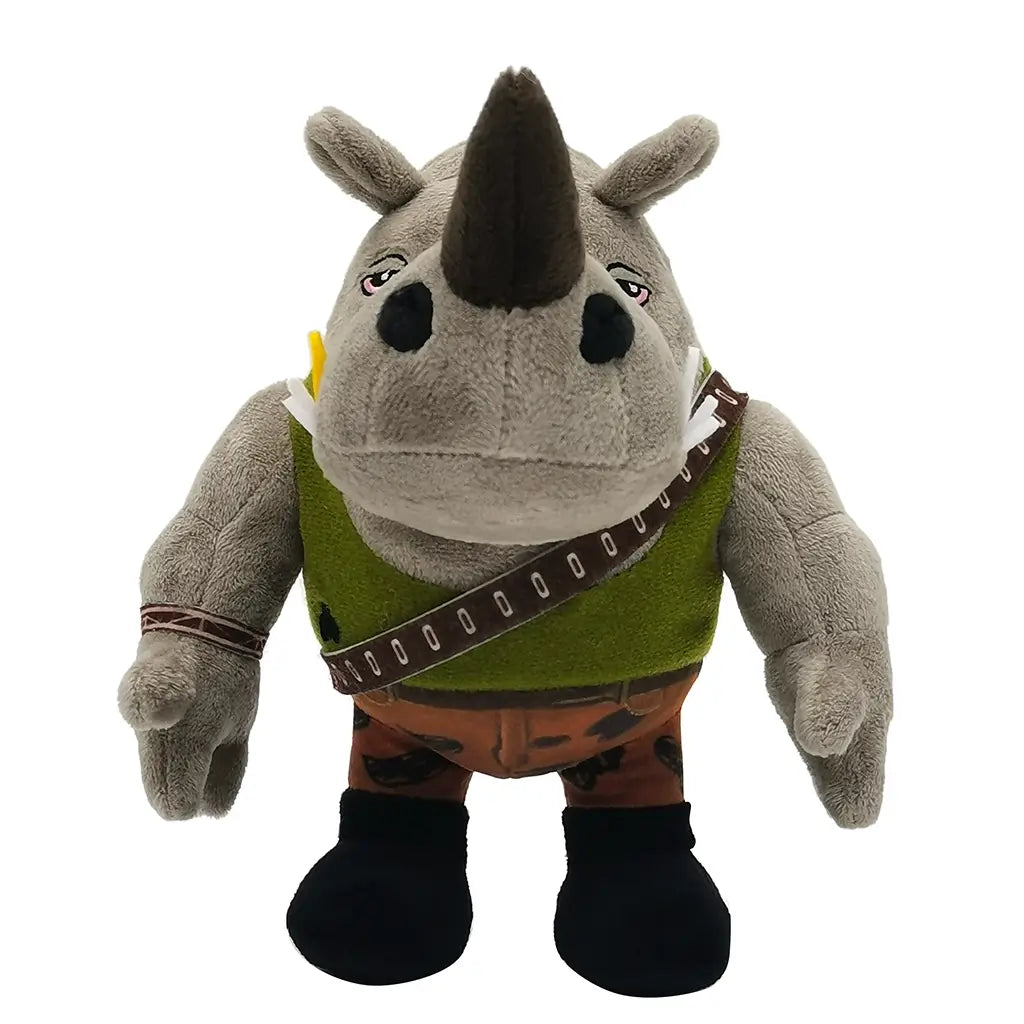 Front-facing Rocksteady plush from Teenage Mutant Ninja Turtles, gray rhino with horn, tusks, green vest, brown camo pants, and black boots, with tough muscular design.