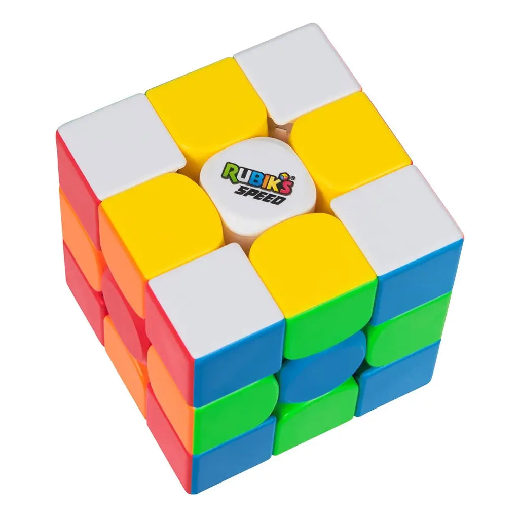 Rubik’s Speed Cube 3x3 puzzle in bright multicolor plastic with smooth matte tiles, compact cubic shape designed for fast solving, shown at an angled view on a clean white background.