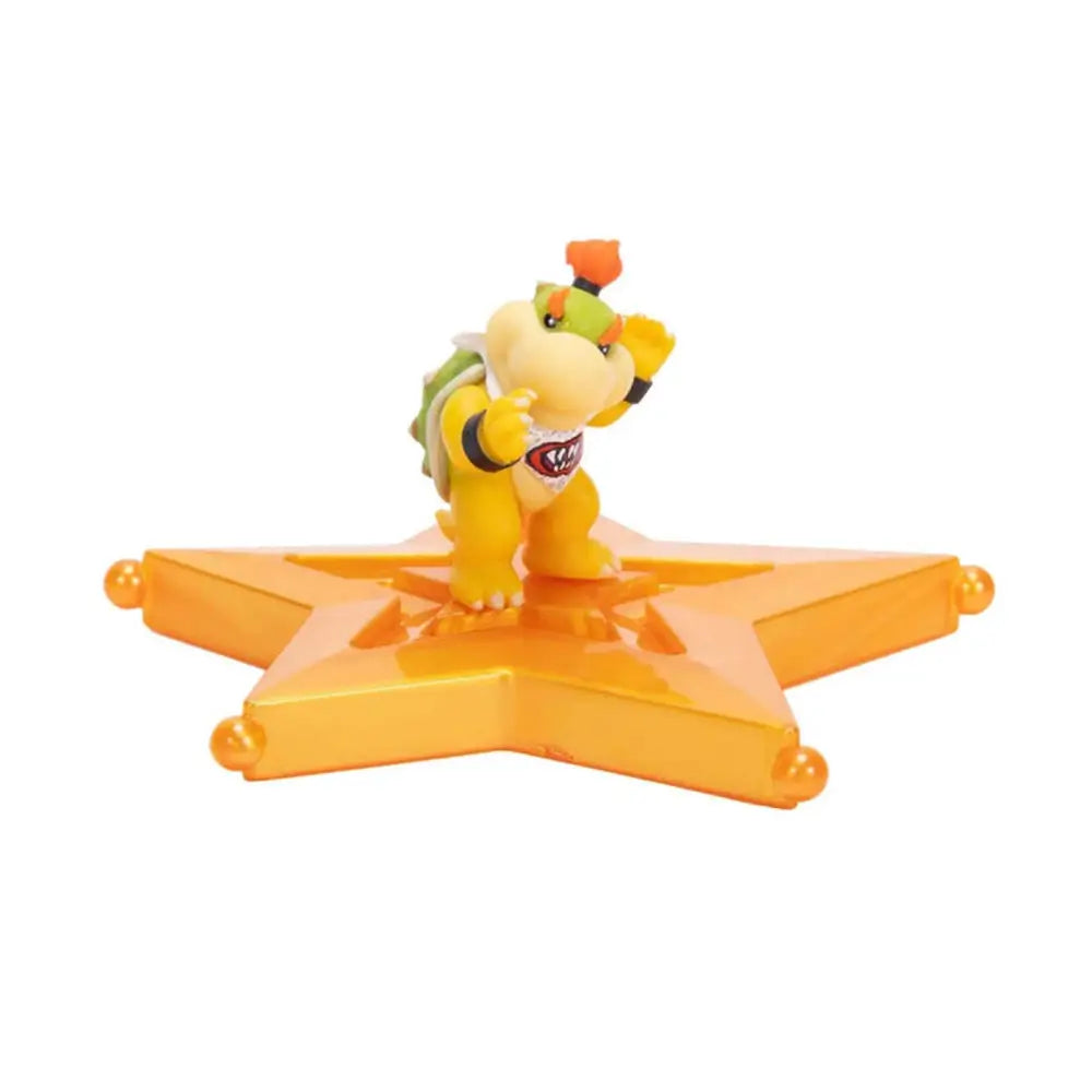 Super Mario Galaxy Bowser Jr action figure in yellow and green plastic with smooth texture and rounded shape, posed on translucent orange star platform for collectible display on a white backdrop