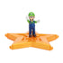 Super Mario Galaxy Luigi figure in green, blue, and white plastic with rounded form and raised arms pose, standing on translucent orange star platform for collectible display on a white backdrop