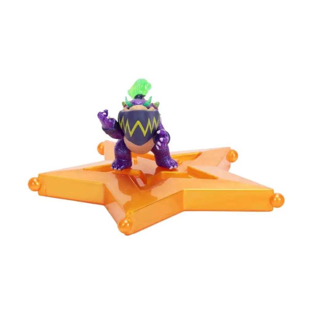 Super Mario Galaxy Wonder Bowser Jr figure in purple and green plastic with spiked shell and mohawk detail, posed on translucent orange star platform, designed for collectible display on a white backdrop