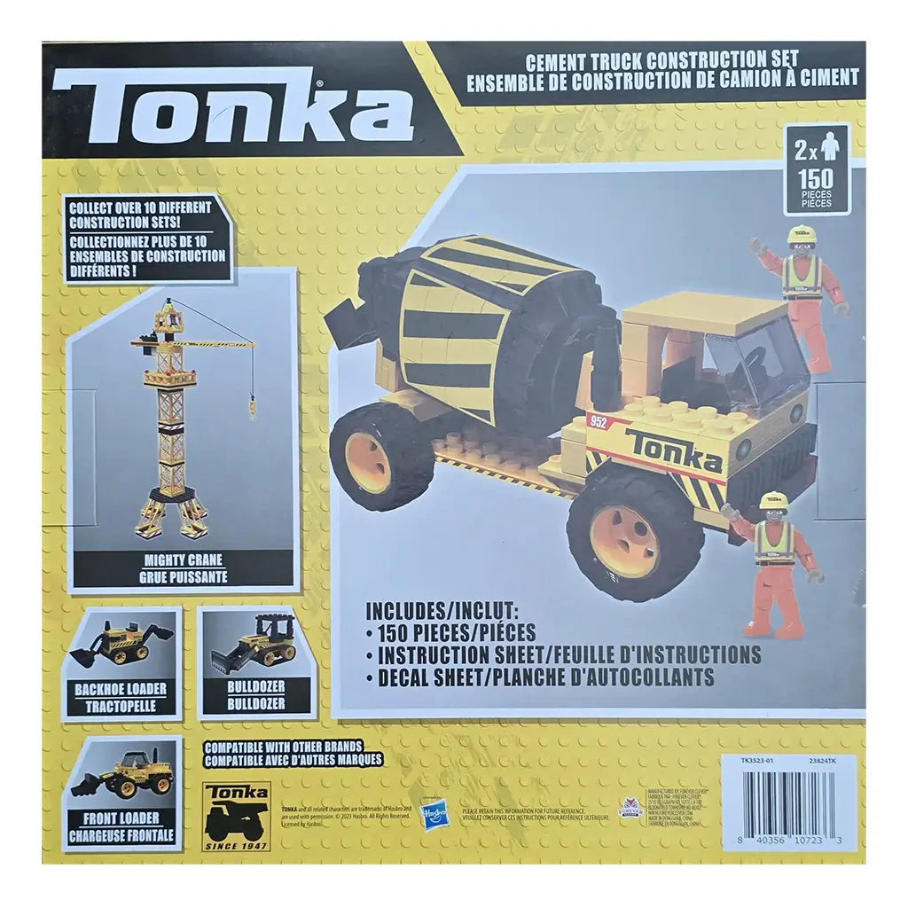 Tonka Mighty Dump Truck Construction Set box showing a large yellow dump truck with bold Tonka branding, 280 pieces, decals, and illustrated construction workers on a rugged dirt background.