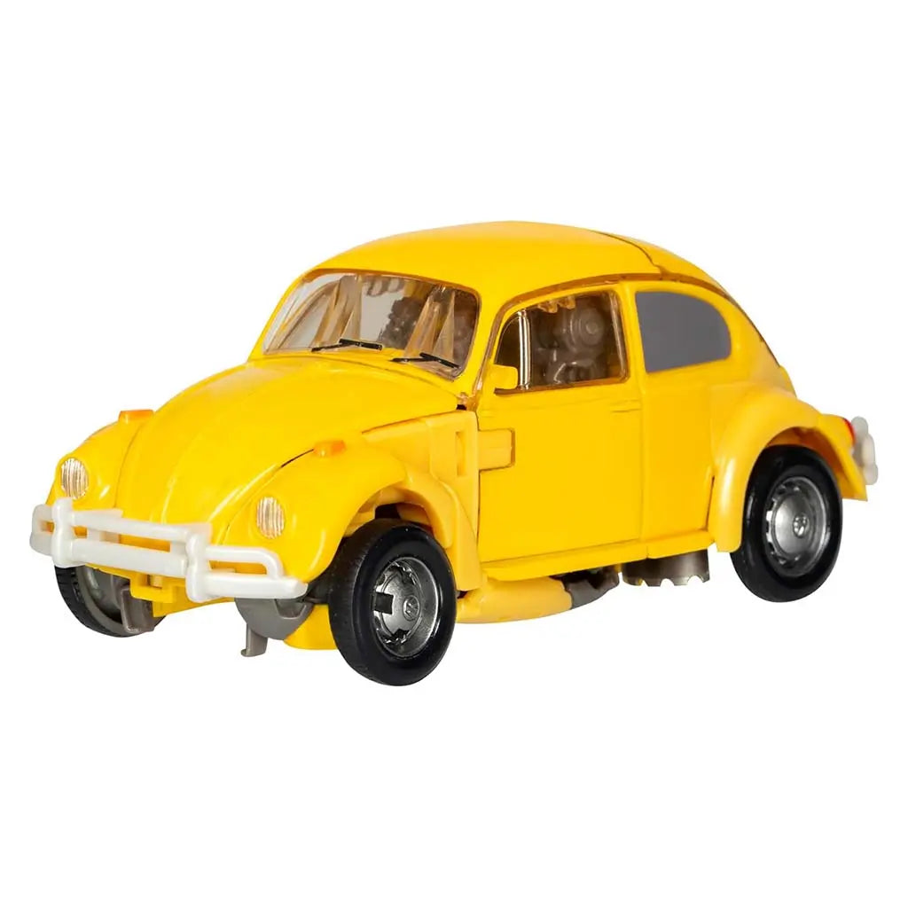 Transformers Bumblebee Volkswagen Beetle mode in vivid yellow with rounded fenders, clear windows, molded headlights, and smooth classic car curves highlighting its iconic alternate vehicle appearance.