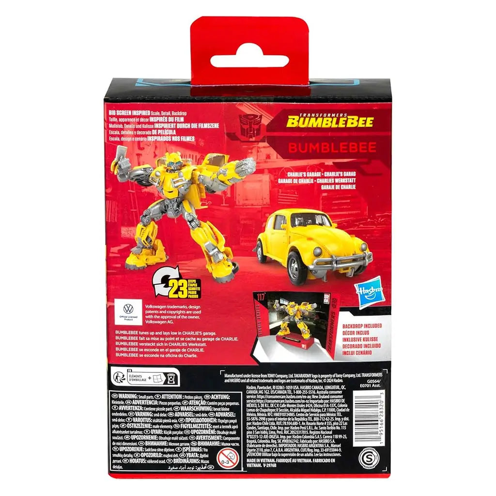 Transformers Bumblebee package back showing robot and yellow Volkswagen Beetle modes, 23-step conversion graphic, multilingual text, and garage-themed background artwork for collectible display detail.