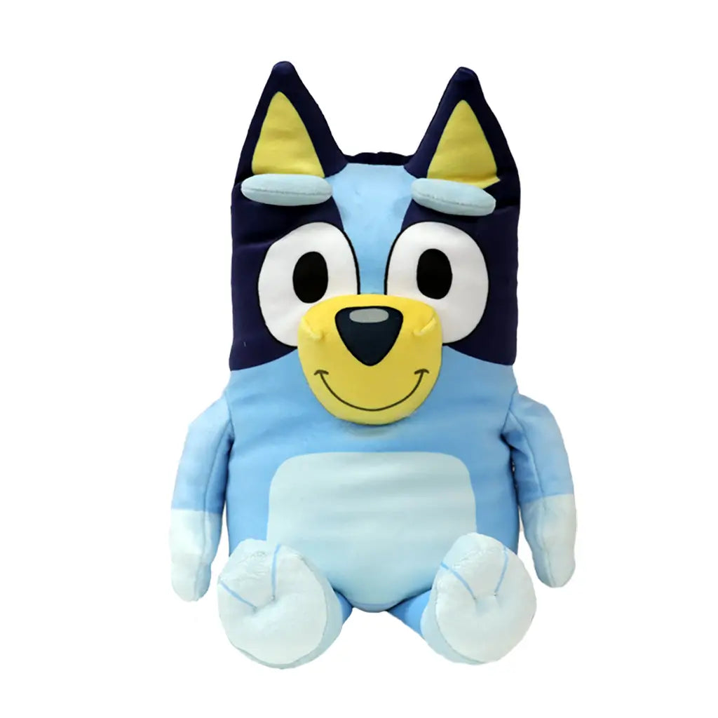 Bluey plush toy in light and dark blue soft fabric with cream muzzle and inner ears, upright seated form with rounded limbs, large oval eyes and smiling face, cuddly plush isolated on white background
