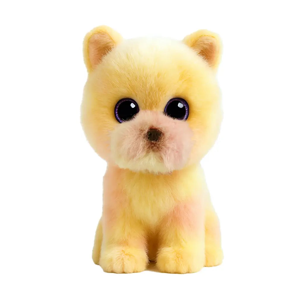 Ty Beanie Babies Palmer Pomeranian plush toy in soft pastel yellow faux fur with small rounded puppy shape, featuring large purple glitter eyes, short snout, tiny ears, and fluffy texture on a white background.