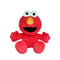 Sesame Street Elmo plush toy in bright red soft fabric with rounded character shape, featuring large white eyes, orange nose, and open smiling mouth, with outstretched arms, on a white background.