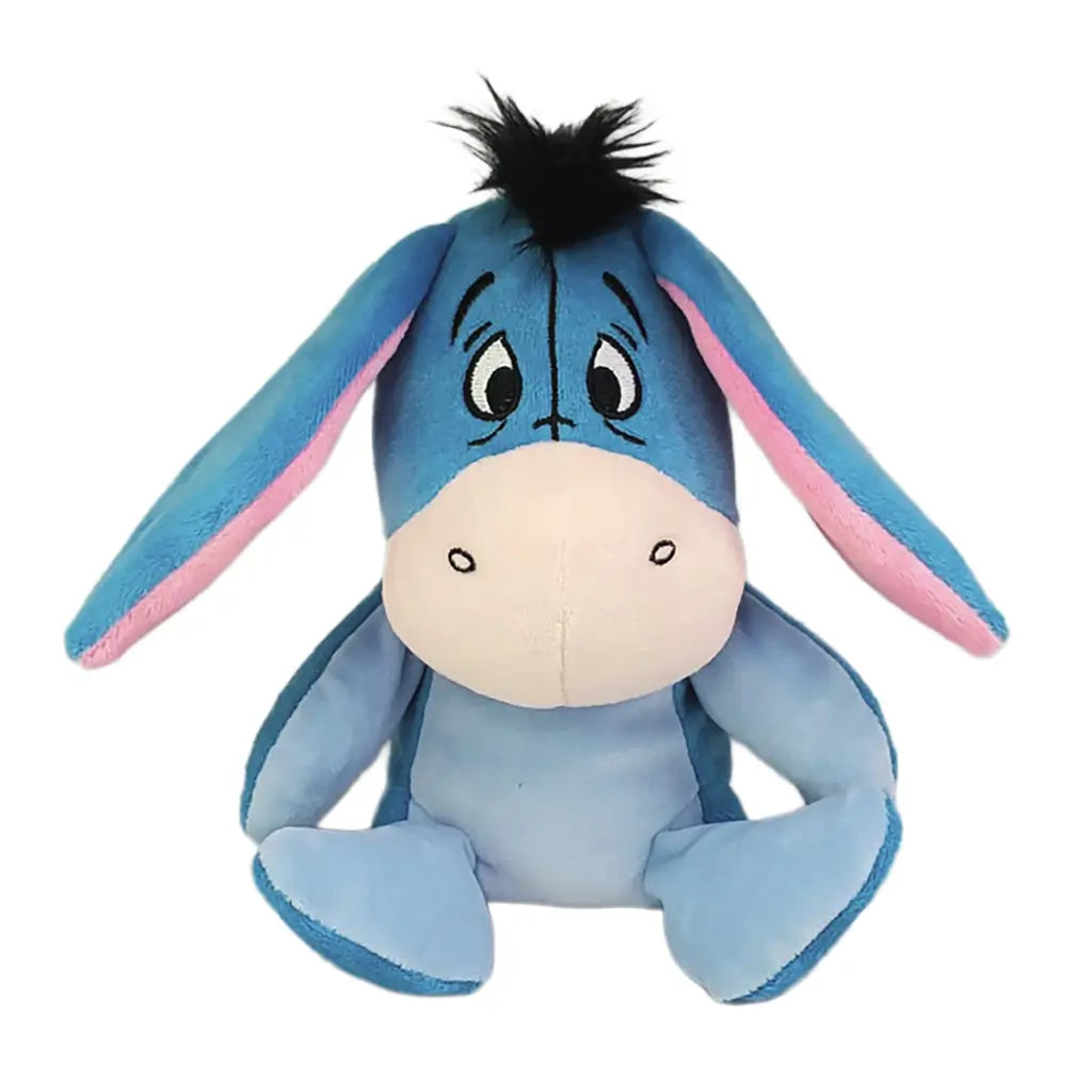 Disney Eeyore plush toy in soft blue fabric with rounded donkey shape, featuring long floppy ears with pink lining, black tufted mane, embroidered eyes, displayed on a plain white background.