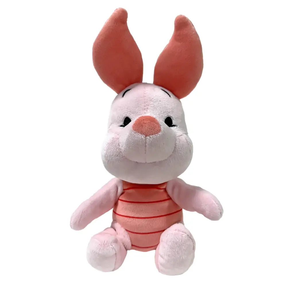 Disney Piglet plush toy in soft light pink fabric with rounded character shape, featuring large upright ears with darker pink inner lining, striped pink torso, and embroidered eyes, on a white background.